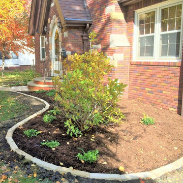 Limestone edging foundation planting
