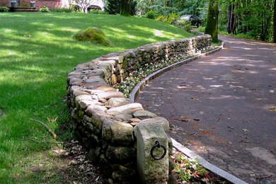 This is an example of a large front yard stone driveway in Boston.