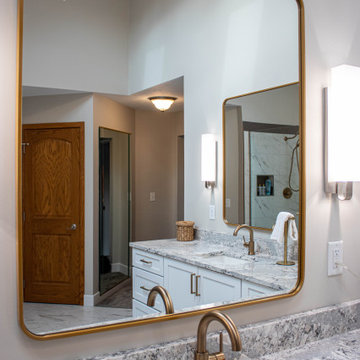 Luxurious White Bathroom with Barrier Free Shower, Make-up area and Storage