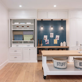 Design ideas for a nautical basement in Los Angeles with beige floors.