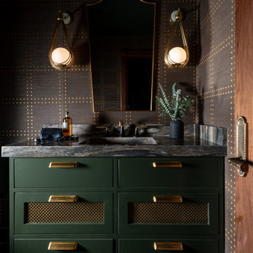 Dark Green Powder Room Vanity with Brass Sconces and Veined Quartz Countertop