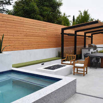 Coastal Modern Landscape with Custom Spa, Fire Feature, Pergola, & BBQ/Bar