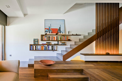 Large modern concrete straight staircase in Alicante-Costa Blanca with concrete risers.