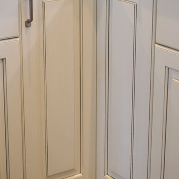 Milton, DE white kitchen and grey island with a pewter glaze