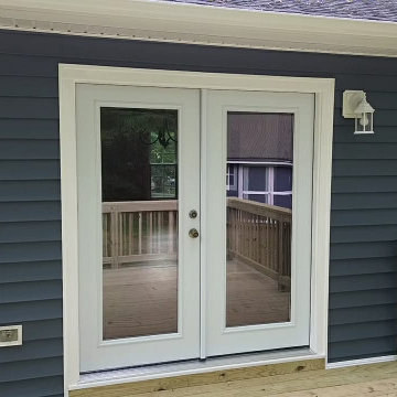 Deck remodeling - siding/windows/gutters replacement