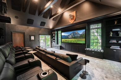 Example of an enclosed home theater design in Philadelphia with a projector screen
