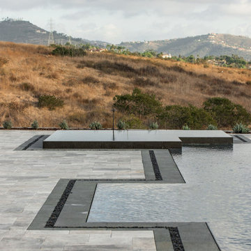 Gorgeous Infinity Pool with Multiple Outdoor Living Spaces