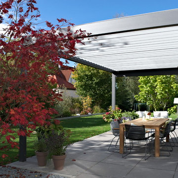 Frei zu öffnendes Terrassendach für ein Einfamilienhaus in München