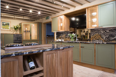 Design ideas for a medium sized modern l-shaped kitchen in Other with granite worktops, mirror splashback and an island.