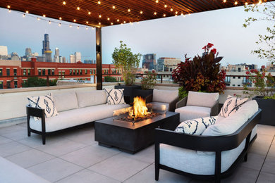 Deck - modern rooftop rooftop deck idea in Chicago with a fire pit and a pergola
