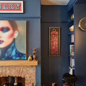 Blue colour drenched maximalist lounge