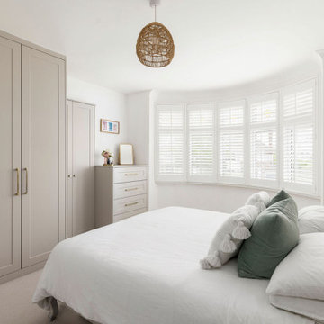 Soft white, elegant and sophisticated master bedroom