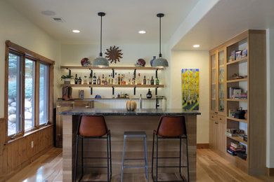 Inspiration for a contemporary home bar remodel in Denver