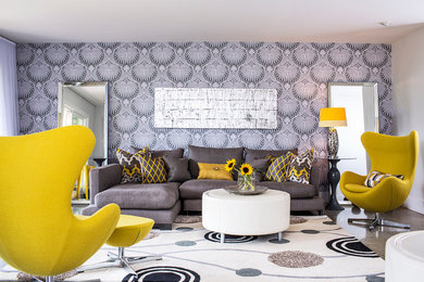Living room - mid-sized modern open concept concrete floor living room idea in Vancouver with gray walls