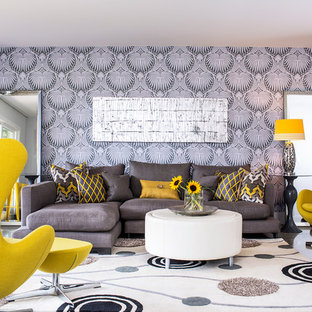 Inspiration för mellanstora moderna allrum med öppen planlösning, med grå väggar och betonggolv