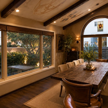 Twilight Dining Room With Hand-Painted Beam Ceiling