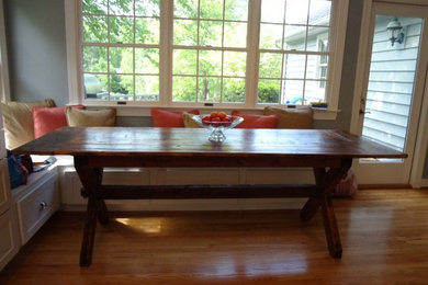 Reclaimed wood cross-leg trestle table with breadboards and bench