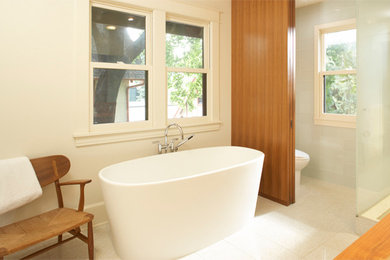 Inspiration for a large contemporary master white tile and glass tile terrazzo floor bathroom remodel in Minneapolis with an undermount sink, flat-panel cabinets, medium tone wood cabinets, wood countertops, a one-piece toilet and white walls