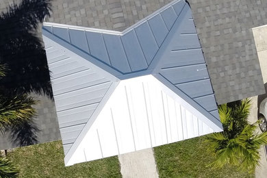 Example of a large beach style exterior home design in Orlando