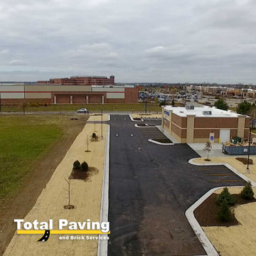Asphalt paving, striping & concrete curve