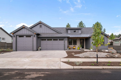 Inspiration for a modern gray one-story house exterior remodel in Other