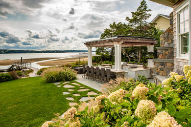 Beach style home design photo in New York
