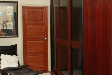 This is an example of a contemporary bedroom in Darwin.