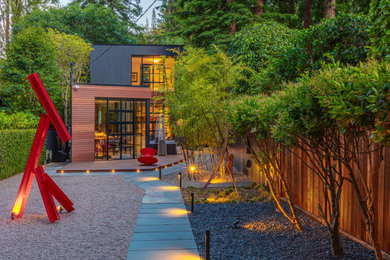 Design ideas for a contemporary partial sun gravel and wood fence landscaping in San Francisco.