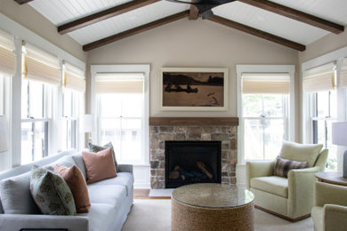 Sunroom - mid-sized farmhouse sunroom idea in Minneapolis with a standard fireplace, a stone fireplace and a standard ceiling