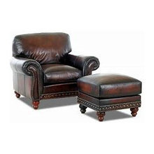 Leather chairs + ottomans