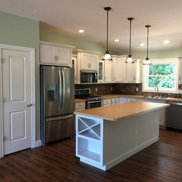 New Construction Milan, IL Koch Express Painted White Formica Amber Maple