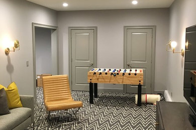 Inspiration for a transitional underground porcelain tile and gray floor basement remodel in New York