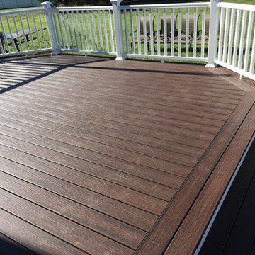 Trex Transcend decking, Picture frame, white trim, vinyl railings