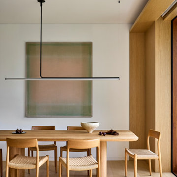 Minimalist Dining Room with Timber Accents