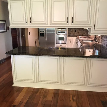 antique white cabinet refacing with brown glazing