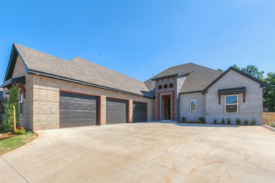Mid-sized brick house exterior photo in Oklahoma City