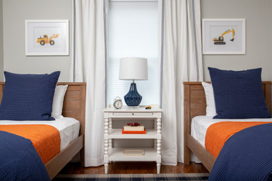 Transitional kids' room photo in New York with gray walls
