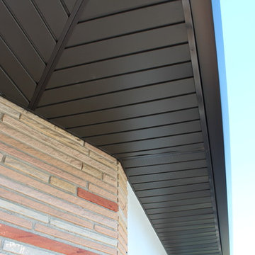 Soffits, Fascia, and Angle Face Gutters in Dark Bronze Aluminum. Long Beach