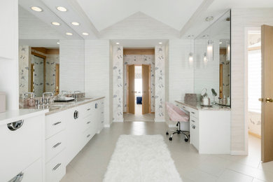 Example of a large trendy master white tile and ceramic tile ceramic tile, gray floor, double-sink, vaulted ceiling and wallpaper bathroom design in Minneapolis with flat-panel cabinets, white cabinets, gray walls, an undermount sink, quartz countertops, a hinged shower door, gray countertops and a built-in vanity