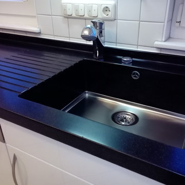 Küchen Renovierung - neue Arbeitsplatte aus Corian Black Quarz