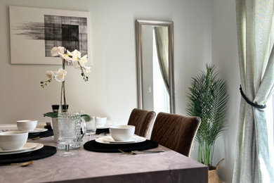 This is an example of a modern dining room in Other.