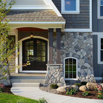Traditional Exteriors Featuring Stone