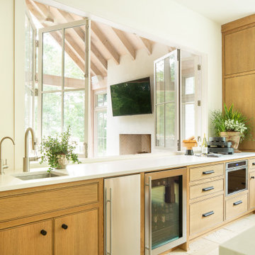 California Modern Mediterranean Kitchen with Limestone Floors & Warm Wood Cabine