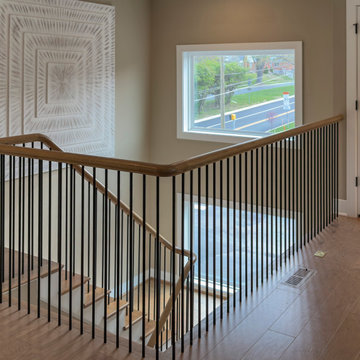 Project #153 | Sophisticated Red Oak Stair with Metal Balusters