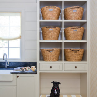 Inspiration for a traditional utility room in Other with a belfast sink, soapstone worktops, white walls and cork flooring.