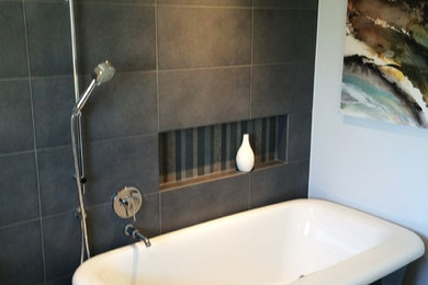 Design ideas for a contemporary bathroom in Toronto with a freestanding tub, gray tile, ceramic tile and ceramic floors.