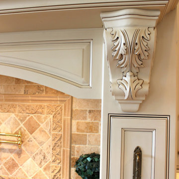 Luxurious Mediterranean Kitchen With A Custom Wood Hood With Acanthus Corbels