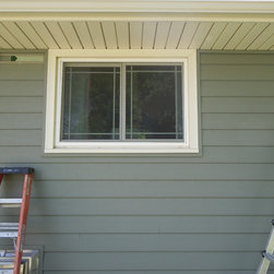 Vinyl Replacement Windows and American Classic Polymeric Siding - Windows