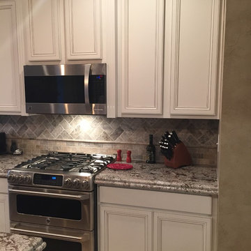 3cm Ogee Bullnose Countertop with Silver travertine tumbled backsplash