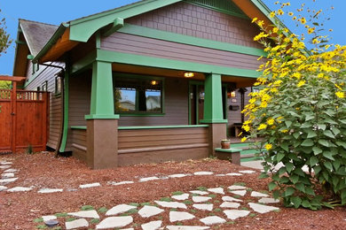 Inspiration for a mid-sized craftsman brown one-story concrete fiberboard gable roof remodel in San Francisco